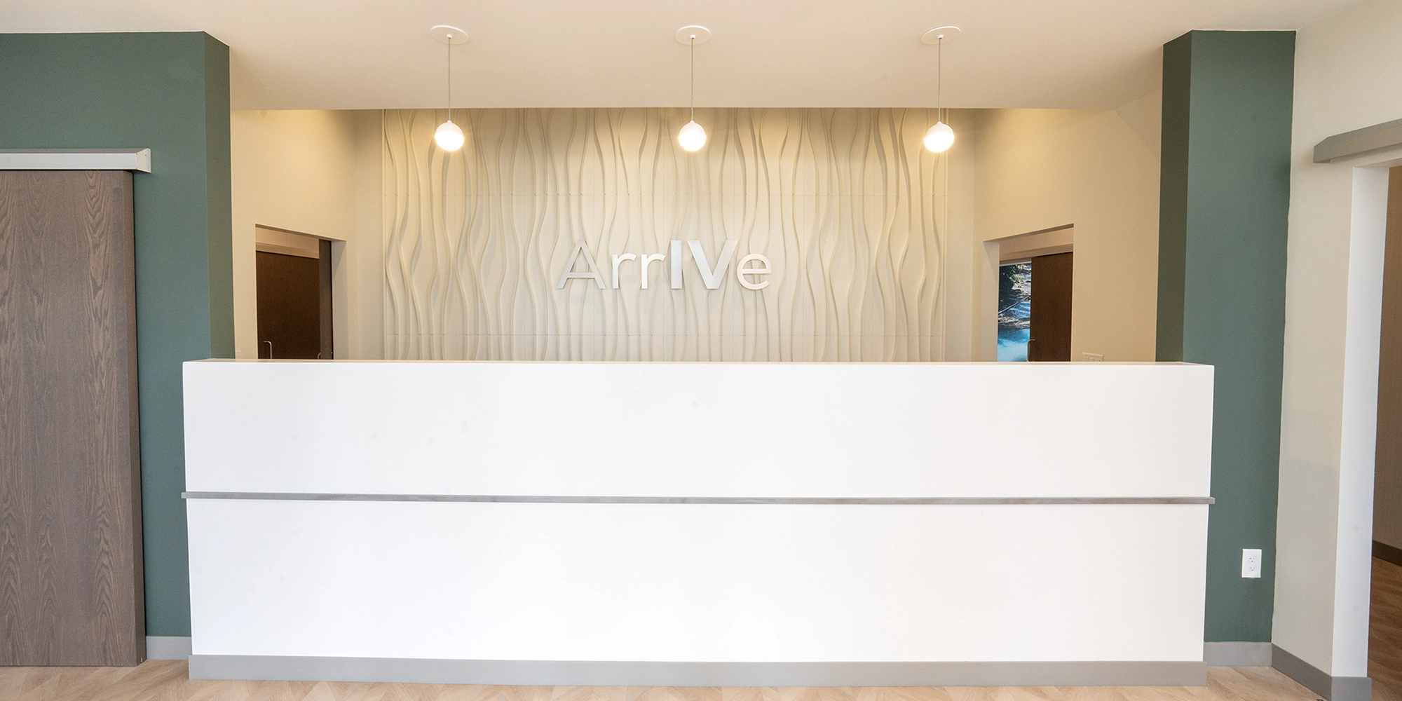 An interior shot of ArrIVe Infusion Therapy featuring the front reception desk
